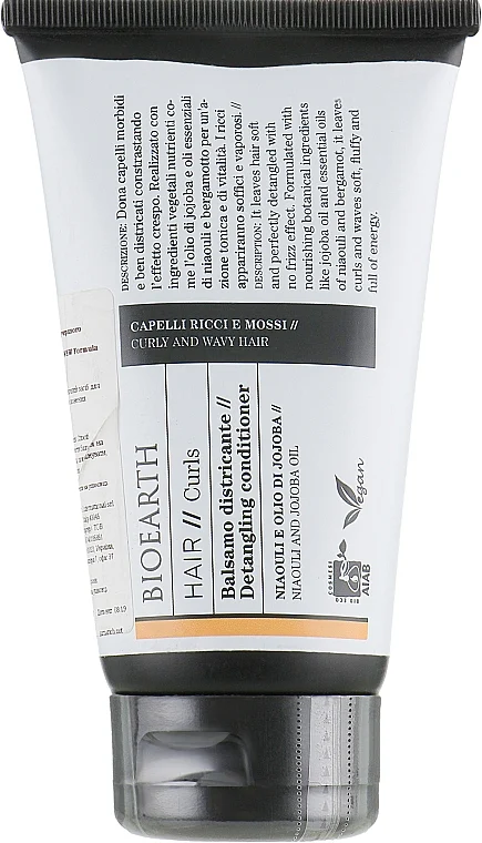 Balsamo districante per capelli ricci